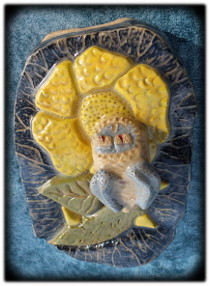 bug with flower ceramic sculpture