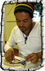 Christian working on his mosaic fish