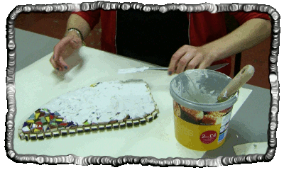 Hari is applying grout