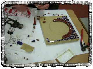 Rob, cutting piece of tile to fit